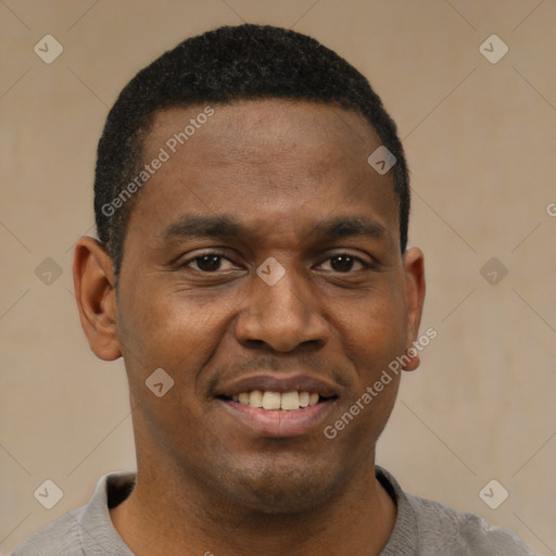 Joyful black young-adult male with short  black hair and brown eyes