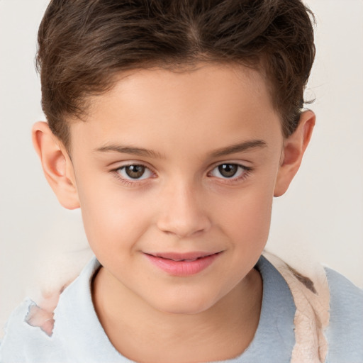 Joyful white child female with short  brown hair and brown eyes