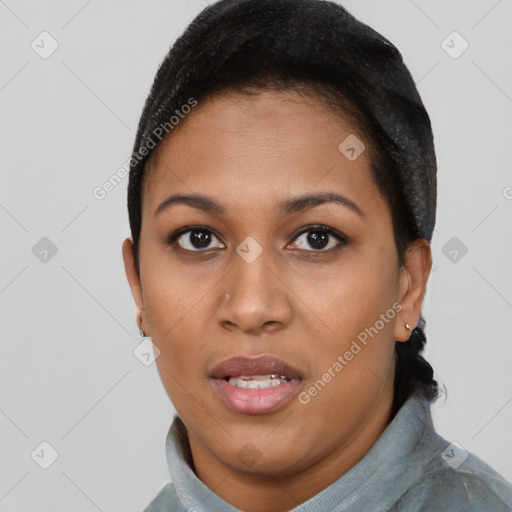 Joyful latino young-adult female with short  black hair and brown eyes