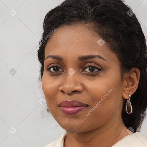 Joyful black young-adult female with medium  brown hair and brown eyes