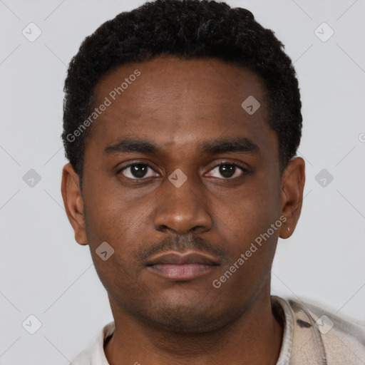 Neutral latino young-adult male with short  brown hair and brown eyes