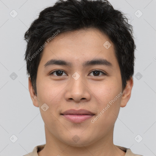 Joyful asian young-adult male with short  brown hair and brown eyes