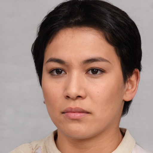 Neutral asian young-adult female with short  brown hair and brown eyes