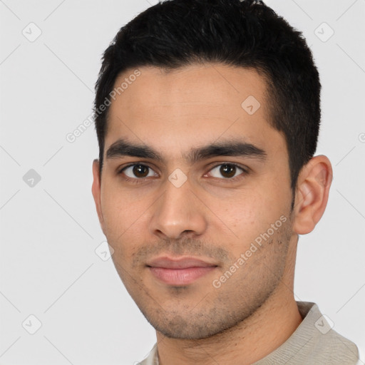 Neutral latino young-adult male with short  black hair and brown eyes