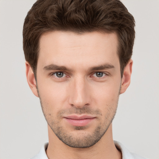 Neutral white young-adult male with short  brown hair and brown eyes