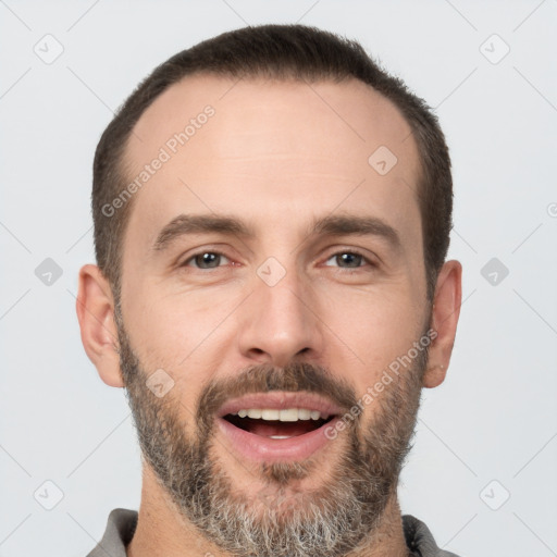 Joyful white adult male with short  brown hair and brown eyes