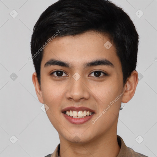 Joyful latino young-adult male with short  black hair and brown eyes