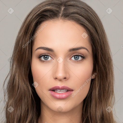 Neutral white young-adult female with long  brown hair and brown eyes