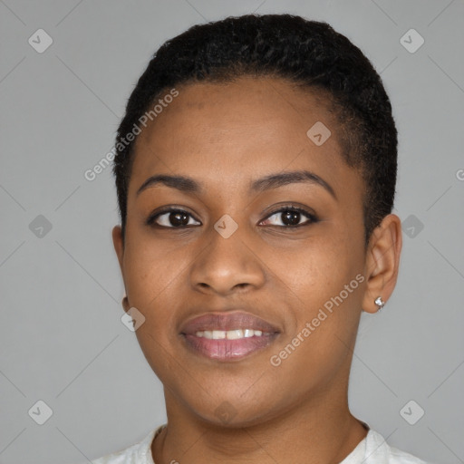 Joyful black young-adult female with short  black hair and brown eyes