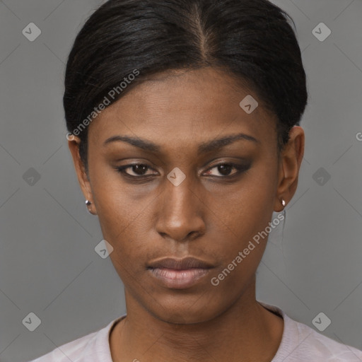 Neutral black young-adult female with short  brown hair and brown eyes