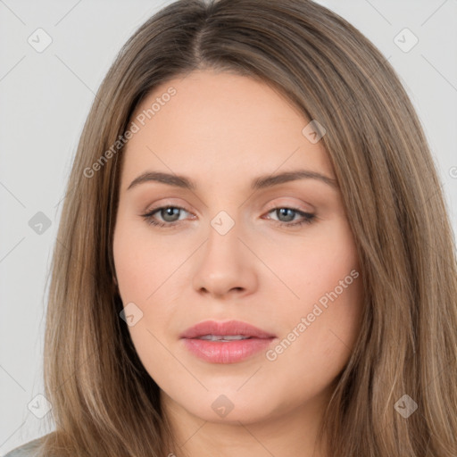 Neutral white young-adult female with long  brown hair and brown eyes