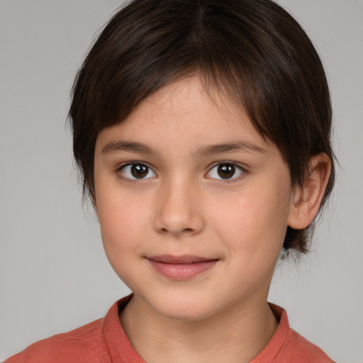 Joyful white child female with medium  brown hair and brown eyes