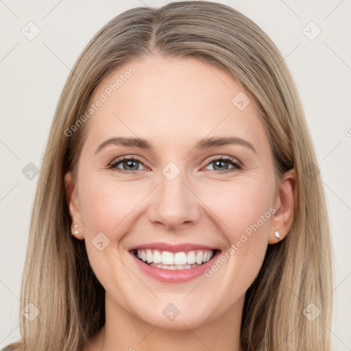 Joyful white young-adult female with long  brown hair and grey eyes