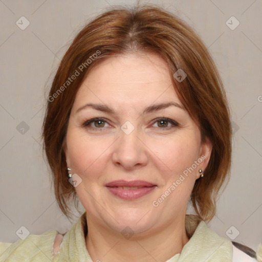 Joyful white adult female with medium  brown hair and brown eyes