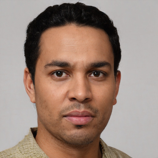 Neutral white young-adult male with short  black hair and brown eyes