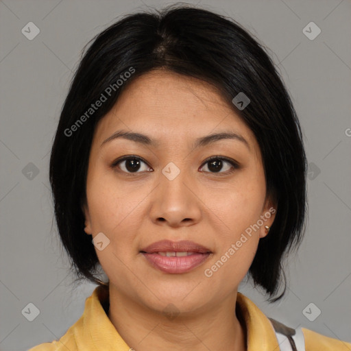 Joyful asian young-adult female with medium  brown hair and brown eyes