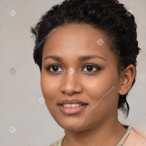 Joyful latino young-adult female with short  black hair and brown eyes