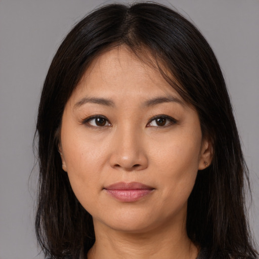Neutral asian young-adult female with long  brown hair and brown eyes