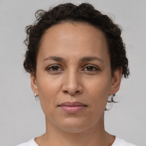 Neutral white young-adult female with short  brown hair and brown eyes