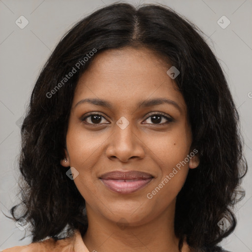 Joyful black young-adult female with medium  brown hair and brown eyes