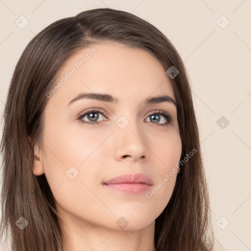 Neutral white young-adult female with long  brown hair and brown eyes