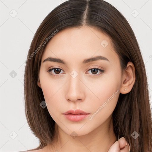 Neutral white young-adult female with long  brown hair and brown eyes