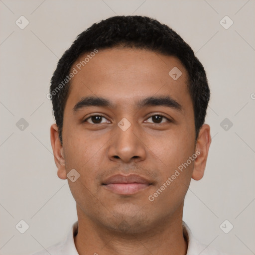 Neutral latino young-adult male with short  black hair and brown eyes