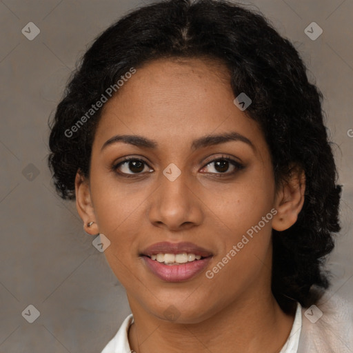 Joyful latino young-adult female with short  brown hair and brown eyes