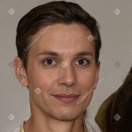 Joyful white adult female with short  brown hair and brown eyes