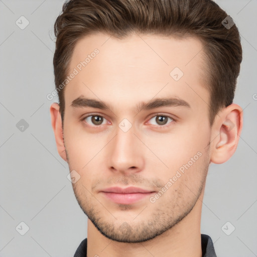 Neutral white young-adult male with short  brown hair and brown eyes