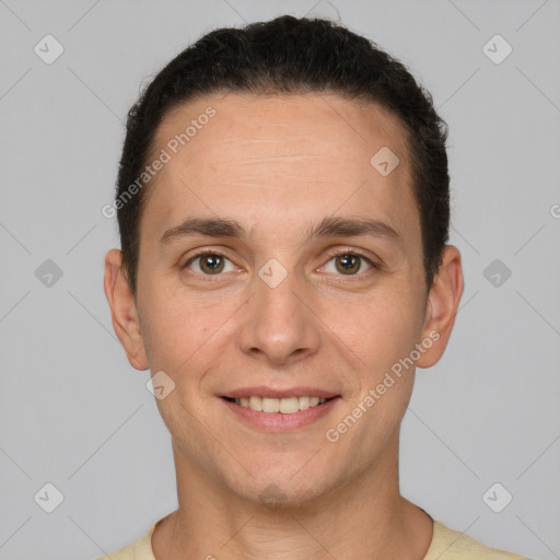 Joyful white young-adult male with short  brown hair and brown eyes