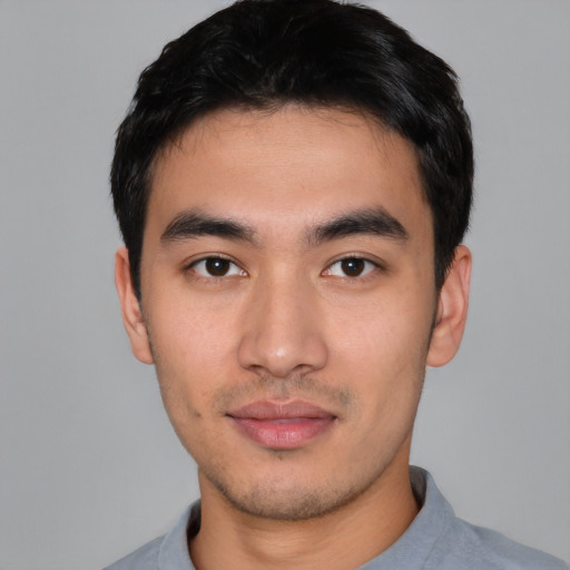 Neutral asian young-adult male with short  black hair and brown eyes