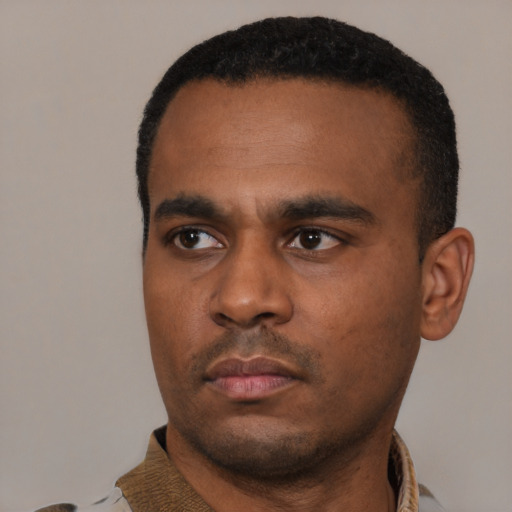 Neutral black young-adult male with short  black hair and brown eyes
