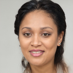 Joyful white adult female with medium  brown hair and brown eyes