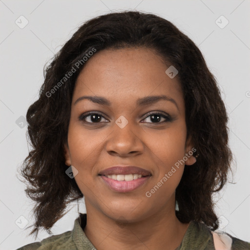 Joyful black young-adult female with medium  brown hair and brown eyes