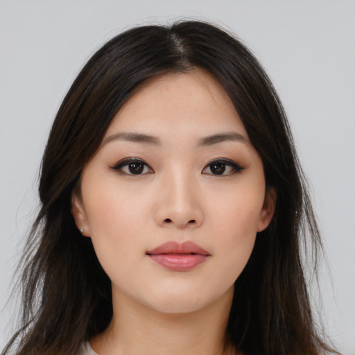 Neutral asian young-adult female with long  brown hair and brown eyes