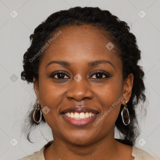 Joyful black young-adult female with medium  black hair and brown eyes