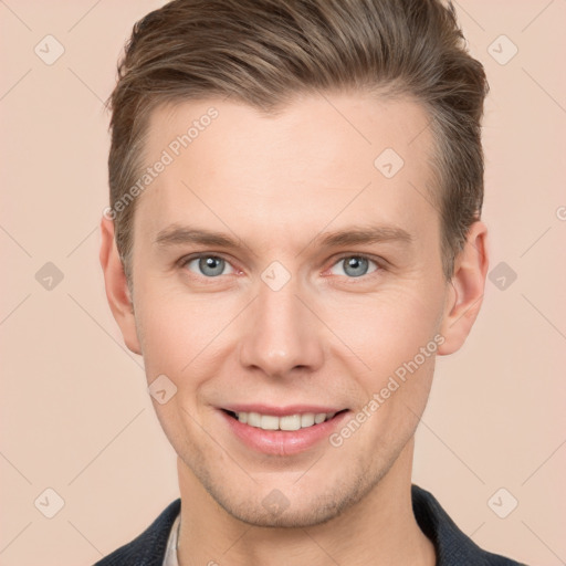 Joyful white young-adult male with short  brown hair and grey eyes