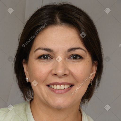 Joyful white adult female with medium  brown hair and brown eyes