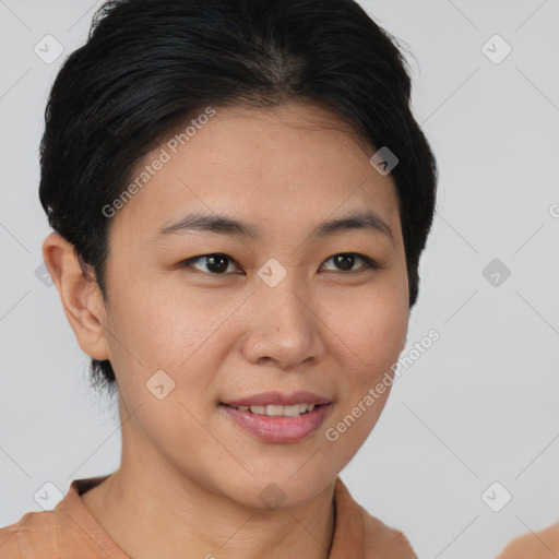 Joyful asian young-adult female with short  brown hair and brown eyes