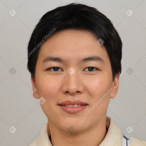 Joyful asian young-adult male with short  black hair and brown eyes