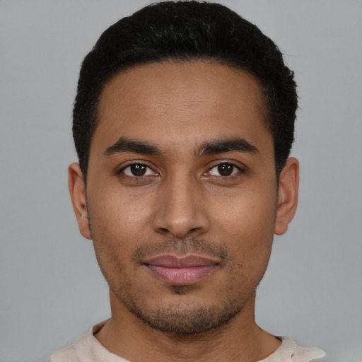 Neutral latino young-adult male with short  black hair and brown eyes