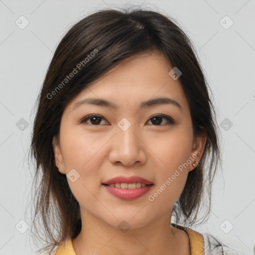 Joyful asian young-adult female with medium  brown hair and brown eyes