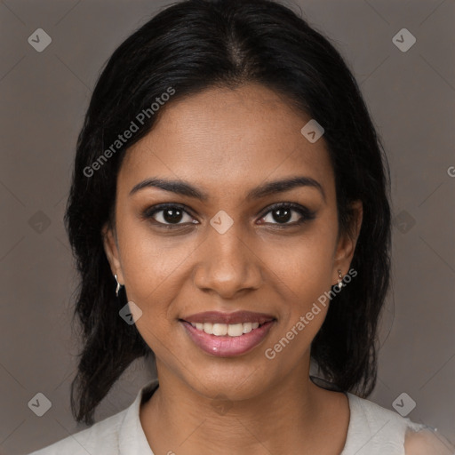 Joyful black young-adult female with medium  brown hair and brown eyes