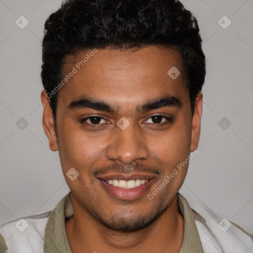 Joyful black young-adult male with short  brown hair and brown eyes