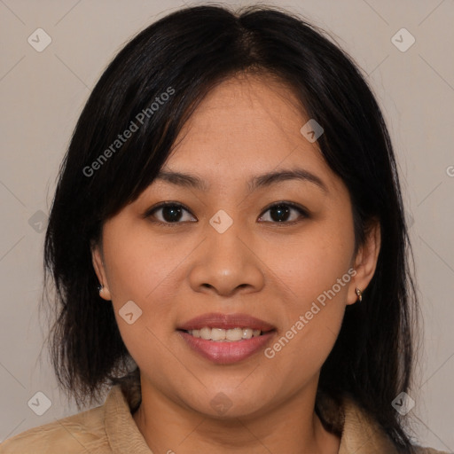 Joyful asian young-adult female with medium  brown hair and brown eyes