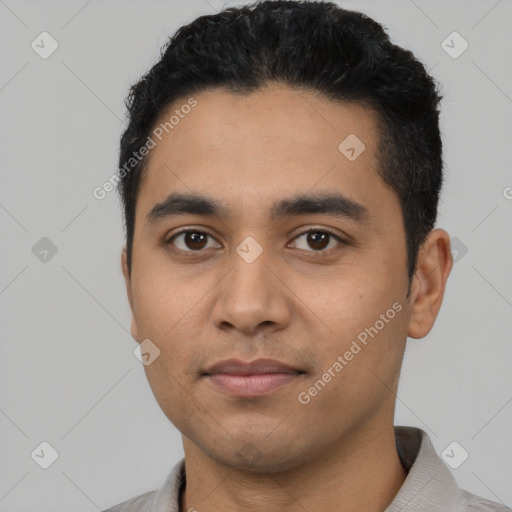 Neutral latino young-adult male with short  black hair and brown eyes