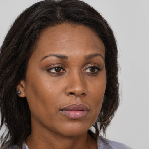 Neutral asian young-adult female with medium  brown hair and brown eyes