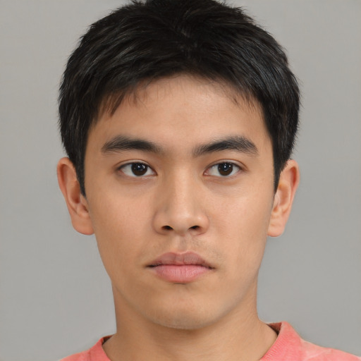 Neutral asian young-adult male with short  brown hair and brown eyes