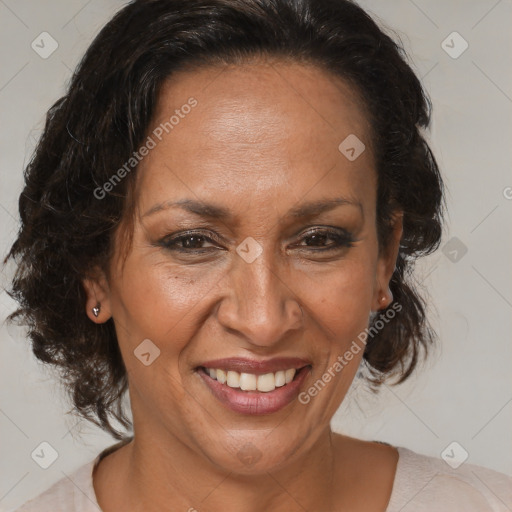 Joyful black adult female with medium  brown hair and brown eyes